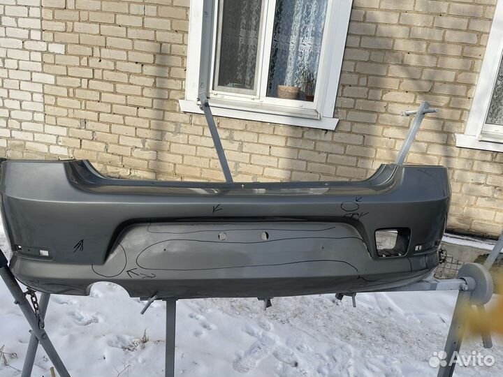 Задний бампер на renault logan 1 фаза 2
