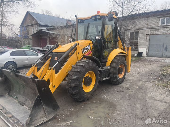 Экскаватор погрузчик.Гидромолот