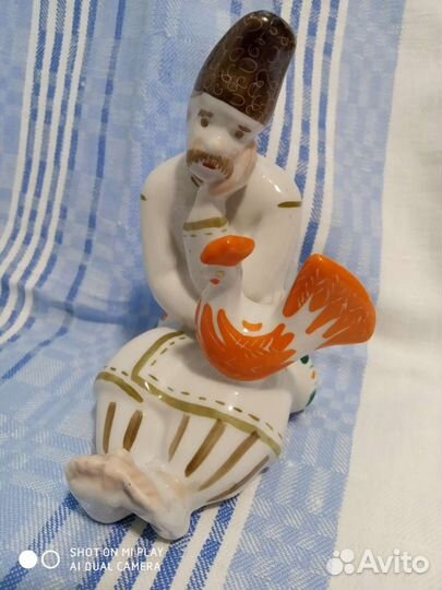 Казак с петухом