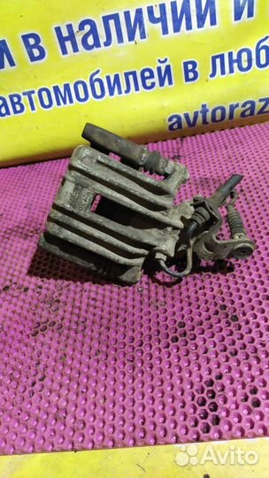 Суппорт тормозной задний левый seat Leon