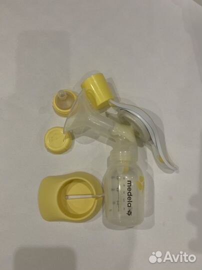 Medela Комплект Молокоотсос ручной+бут+накладки
