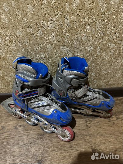 Роликовые коньки