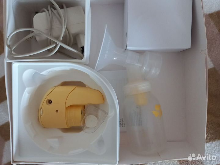 Электрический молокоотсос