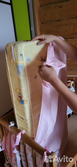 Детская кроватка с продольным маятником