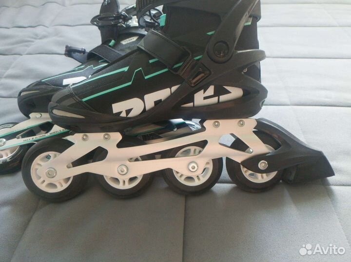 Роликовые коньки roces