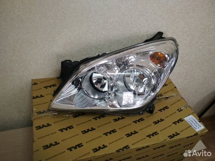Фара левая Opel Astra H