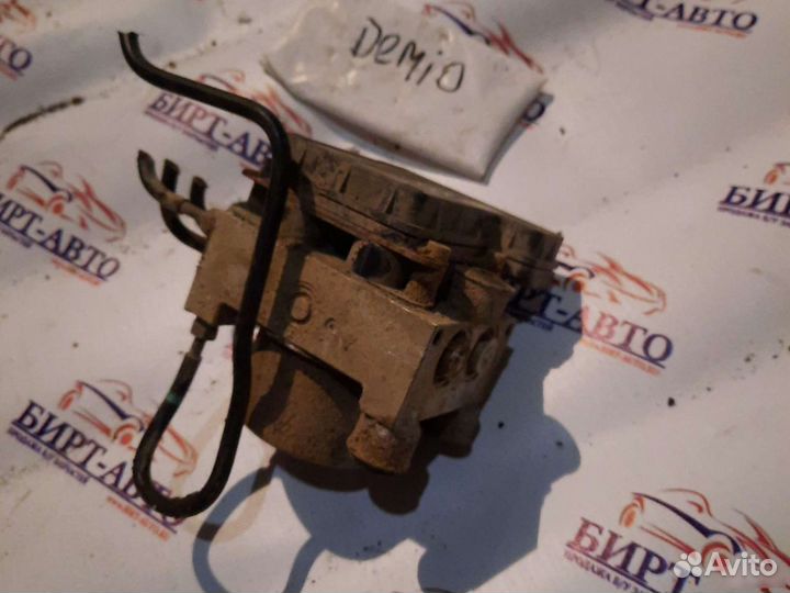 Блок abs mazda demio