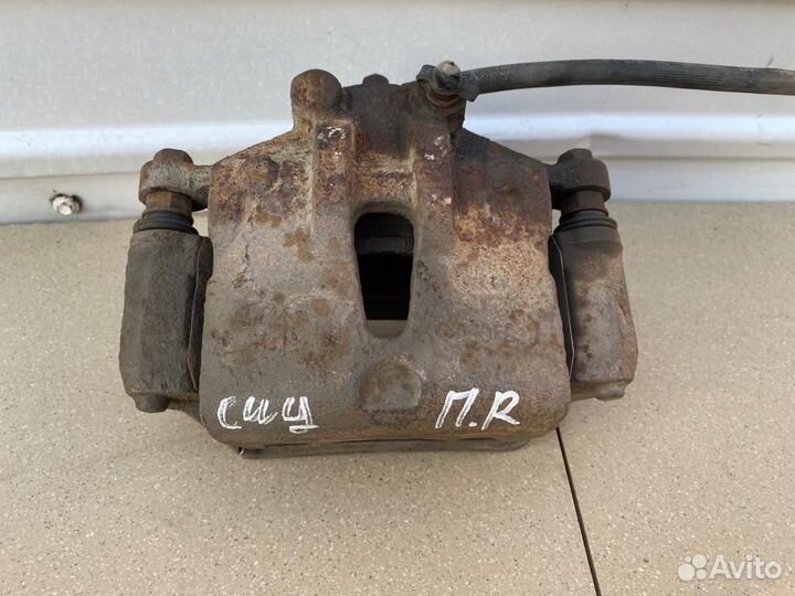 Тормозной суппорт передний правый Kia Ceed (ED)