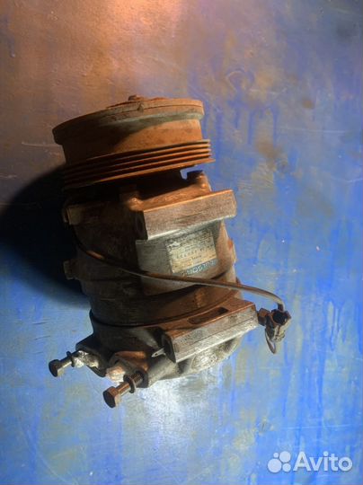 Компрессор кондиционера subaru 73011aa090