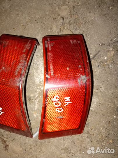 Отражатель в бампер задний Opel Omega универсал