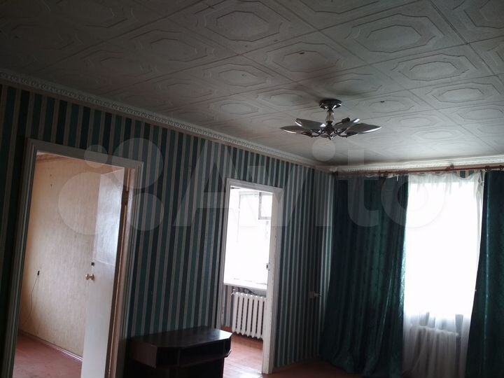 Доля в 4-к. квартире, 60 м², 5/5 эт.