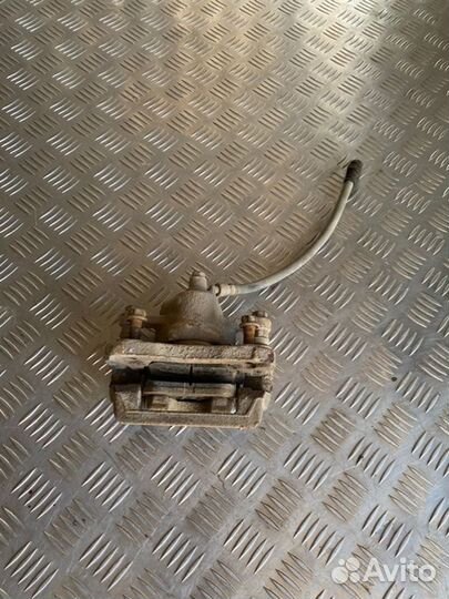 Суппорт тормозной задний правый Hyundai Elantra HD