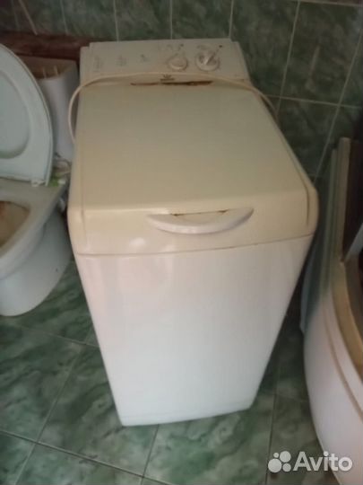 Стиральная машина с вертикальной загрузкой