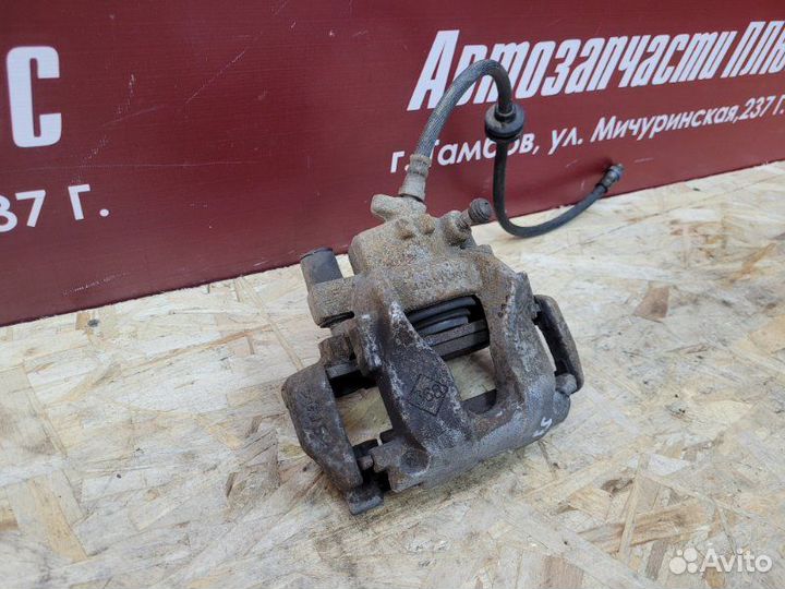 Суппорт тормозной передний левый Renault Logan