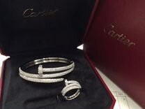 Браслет и кольцо Cartier из золота