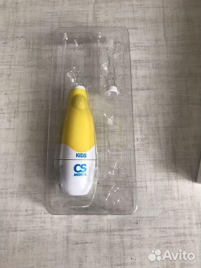 Электрическая зубная щетка