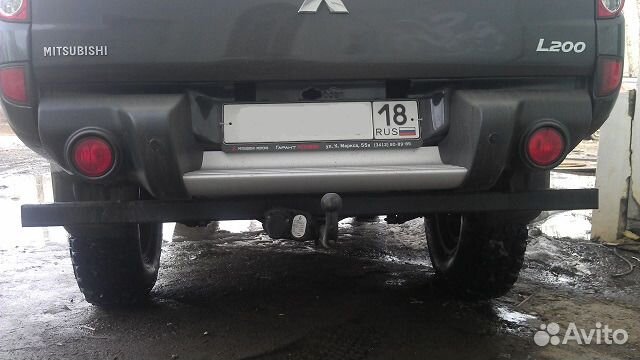 Фаркоп (новый) на Mitsubishi L-200 с 06