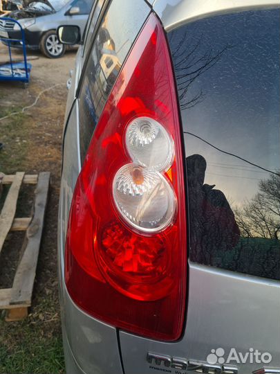 Фонарь задний левый Mazda 5 CR оригинал