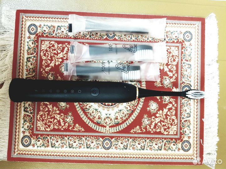 Электрическая зубная щетка новая