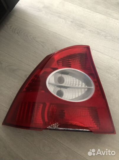 Задний левый фонарь форл фокус 2 седан