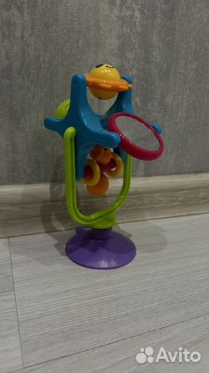 Игрушка вертушка на присоске