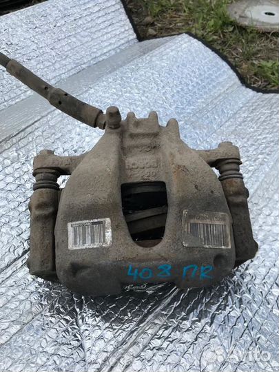 Суппорт тормозной передний правый Peugeot 408