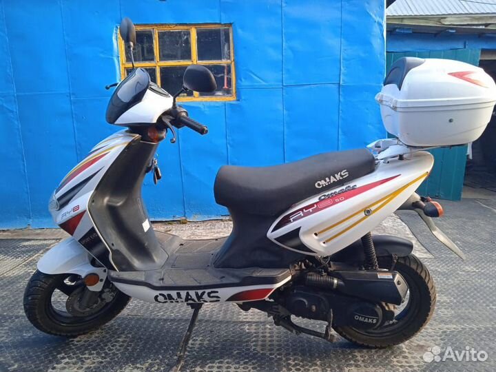 Скутер Omaks