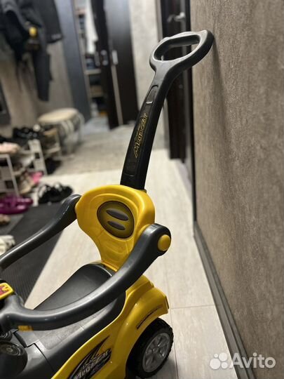 Детская машинка каталка с ручкой музыкальная