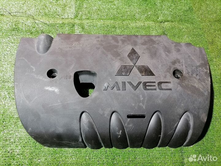 Декоративная крышка двс 1003A058 Mitsubishi Outlan