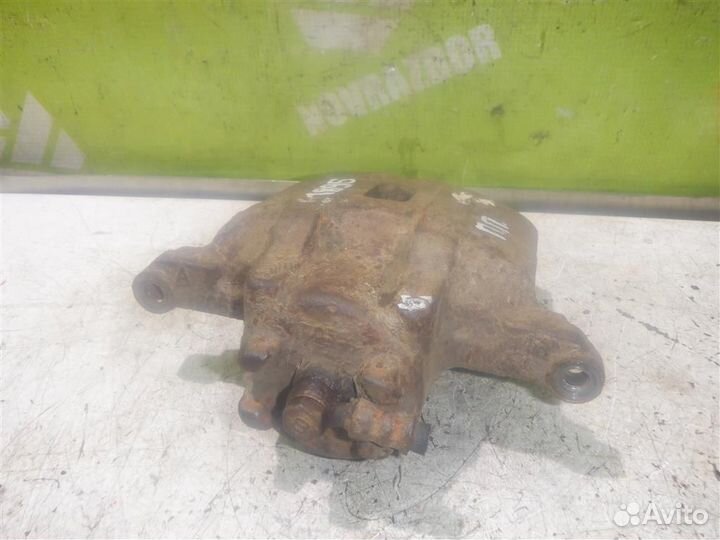 Суппорт передний правый Митсубиси Галант 9