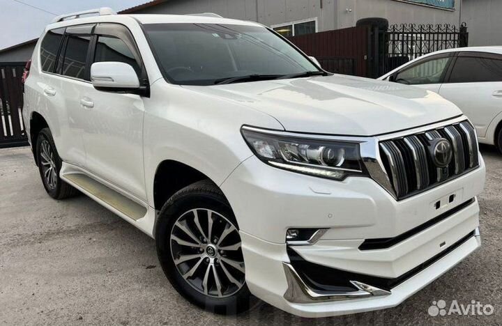 Тросик ручника задний левый Toyota Land Cruiser