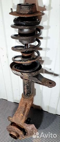 Кулак поворотный в сборе левый Daewoo Nexia N100