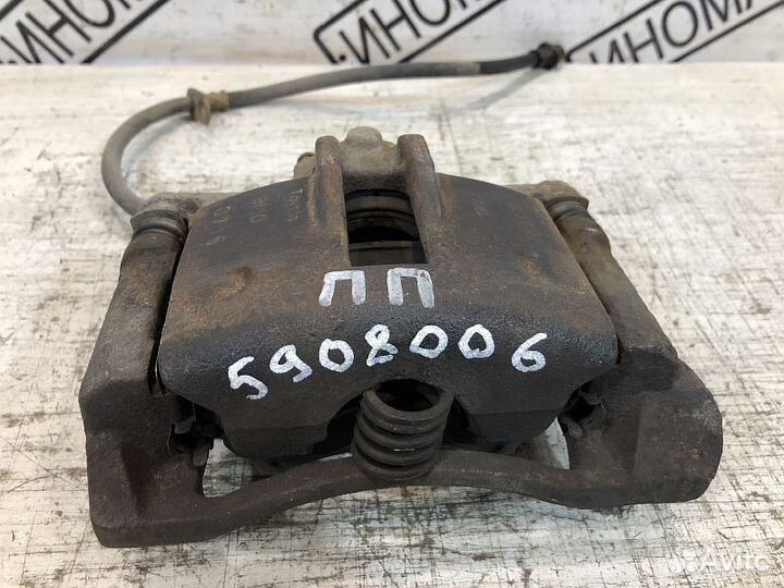 Суппорт тормозной Toyota Corolla E120