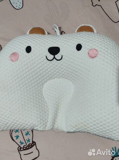 Анатомическая подушка для новорожденных