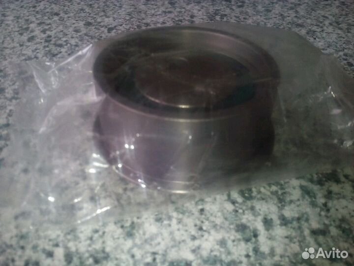 Ролик натяжения ремня грм на хендай туссан