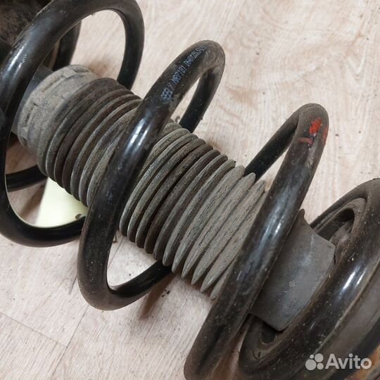 Амортизатор передний правый Geely Emgrand EC7