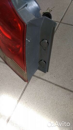 Фонарь задний левый