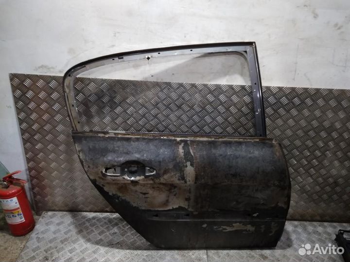 Дверь Megane 2 (03-09) зад R после пожара б\у (арт. 7751475036)