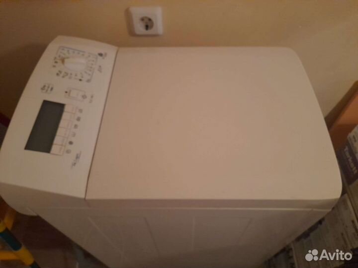 Стиральная машина с вертикальной загрузкой