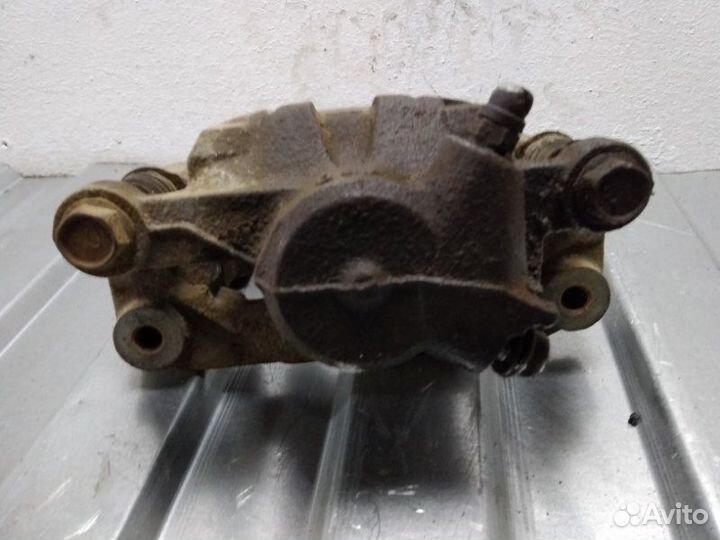 Суппорт задний задний левый Subaru Impreza