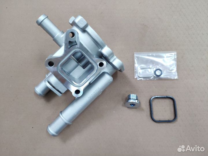 Kорпус термостата Opel Astra