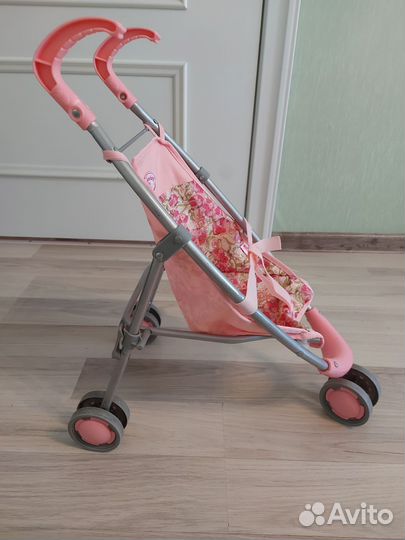 Детская игрушечная коляска