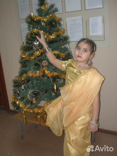 Новогодние костюмы и платья