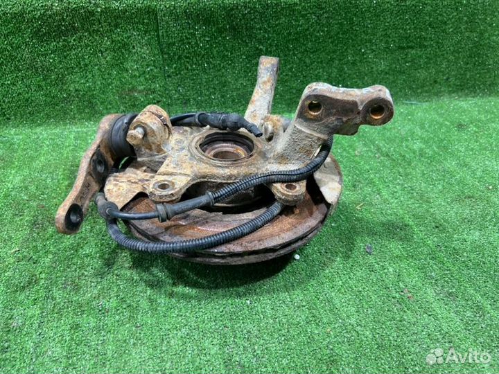 Кулак поворотный передний левый Kia Shuma седан