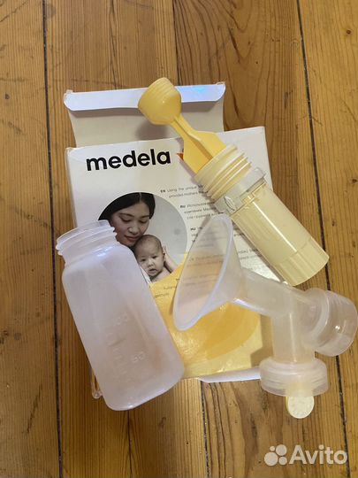 Молокоотсос medela ручной