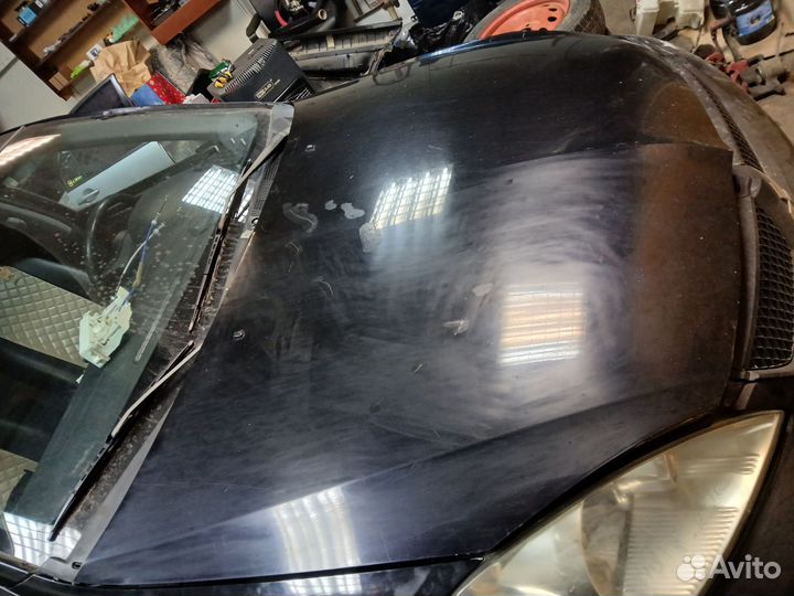Капот Lancer 9
