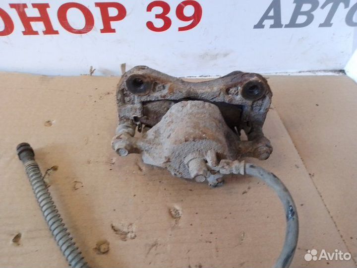 Суппорт тормозной передний левый Hyundai Matrix