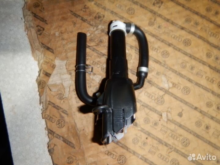 Форсунка омывателя фары левая Outlander XL