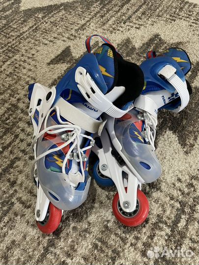 Роликовые коньки