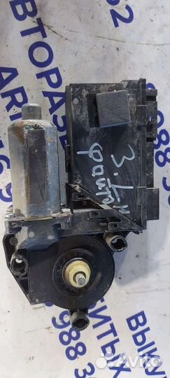 Моторчик стеклоподъёмника задний левый на Volkswag